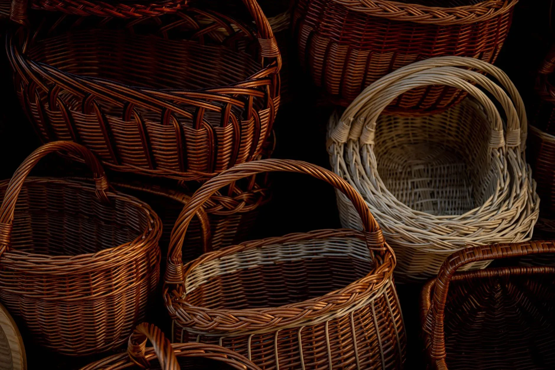 Beautifully arranged wicker and rattan baskets showcasing handmade craftsmanship.