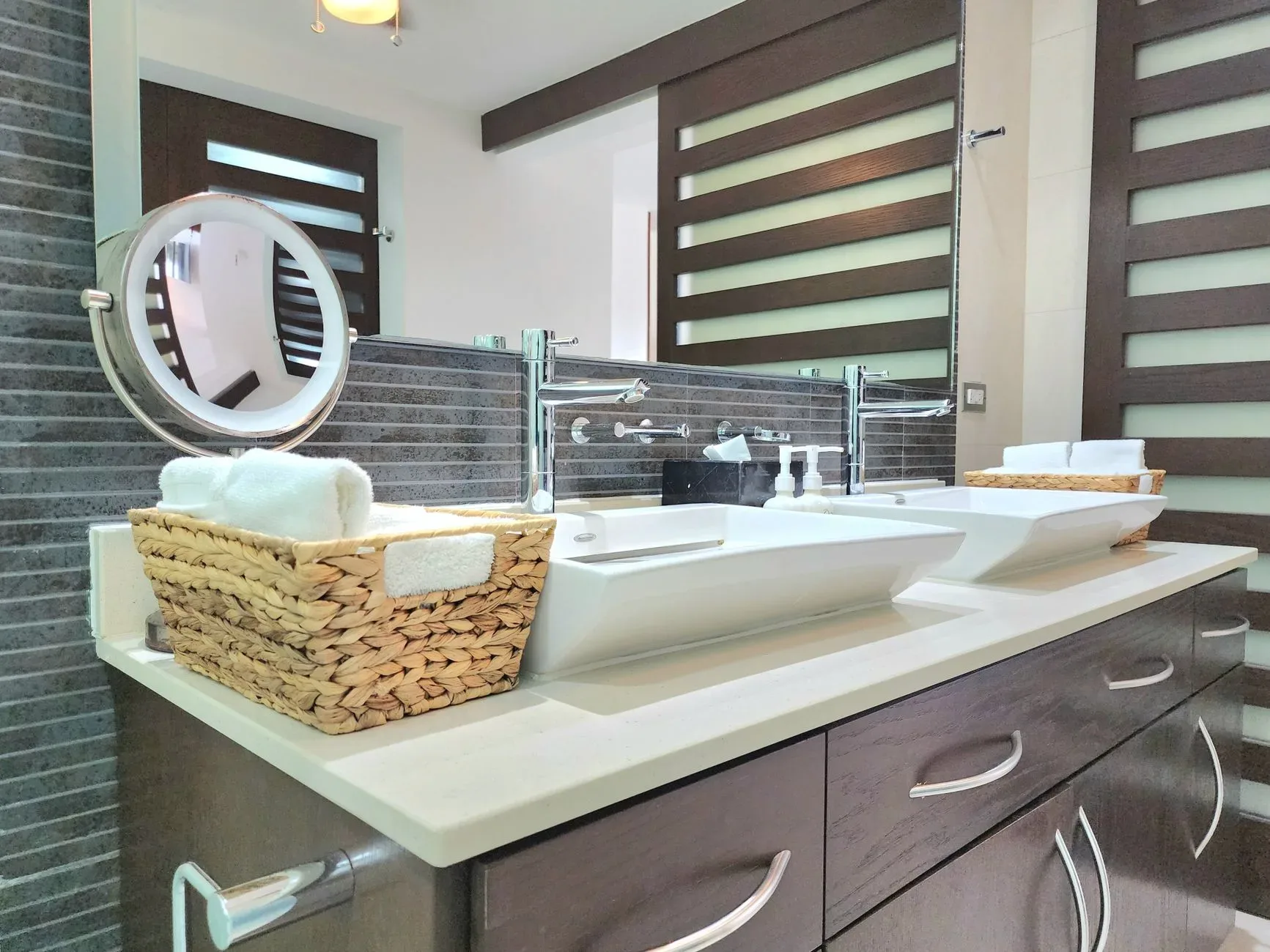 Contemporary bathroom design featuring a sleek double vanity and elegant decor elements.