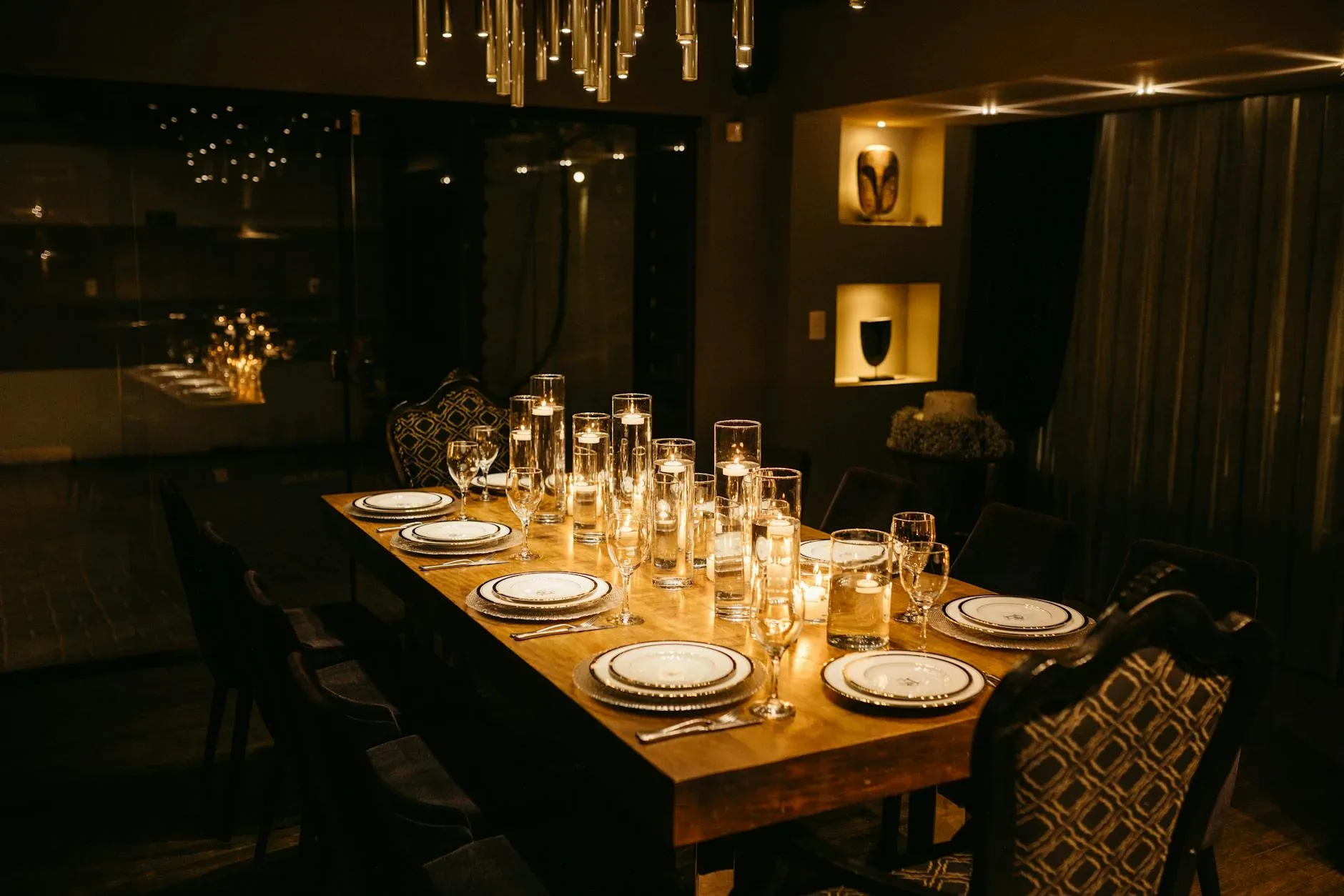 Luxurious dining room with an elegantly set candlelit table, perfect for special occasions.