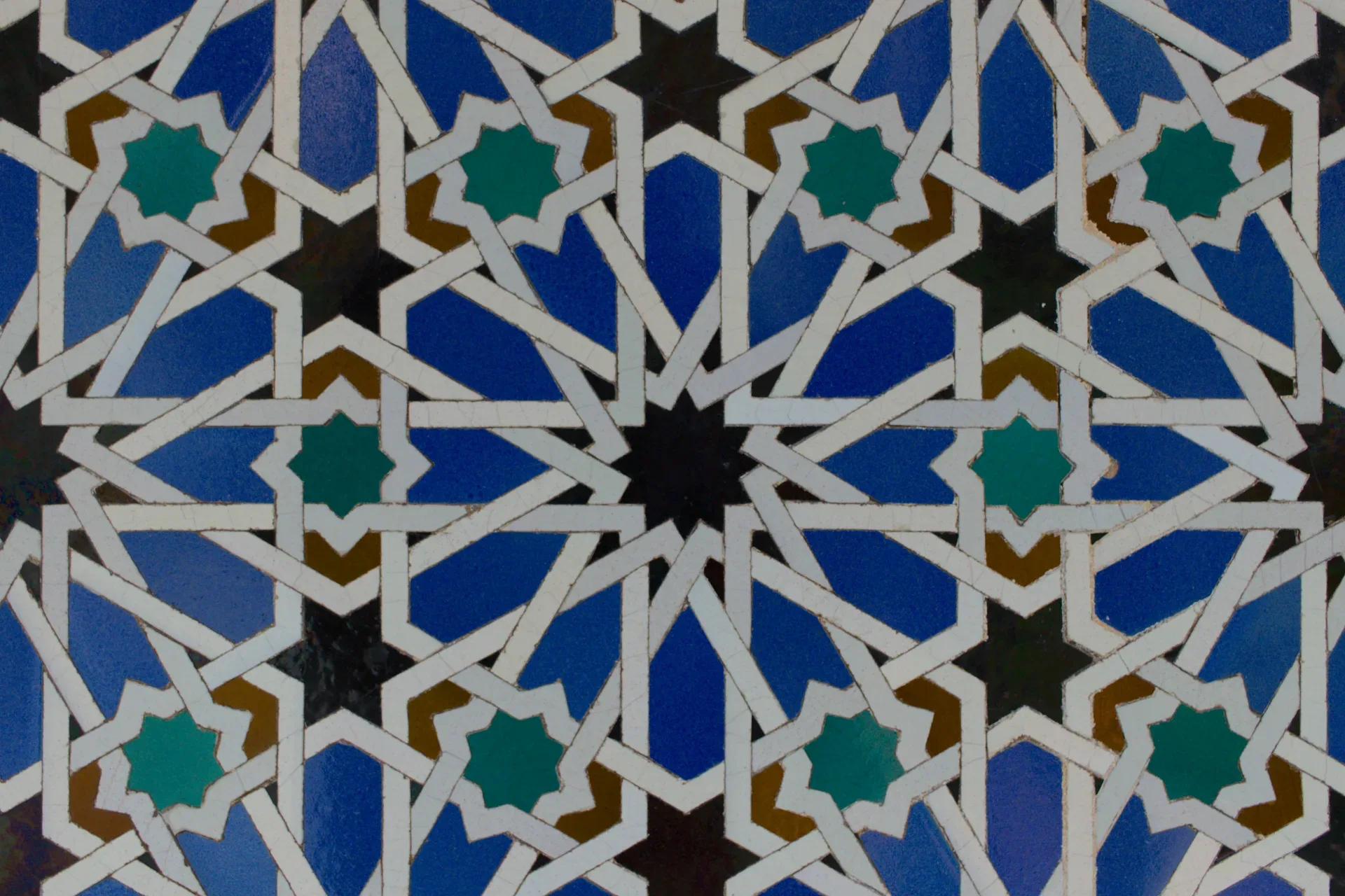 a close up view of a colorful tile pattern