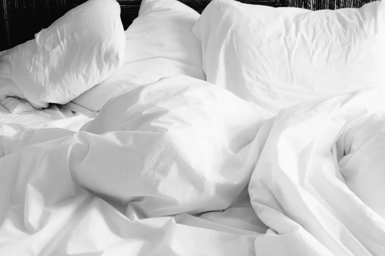 white linen duvet cover bed styled